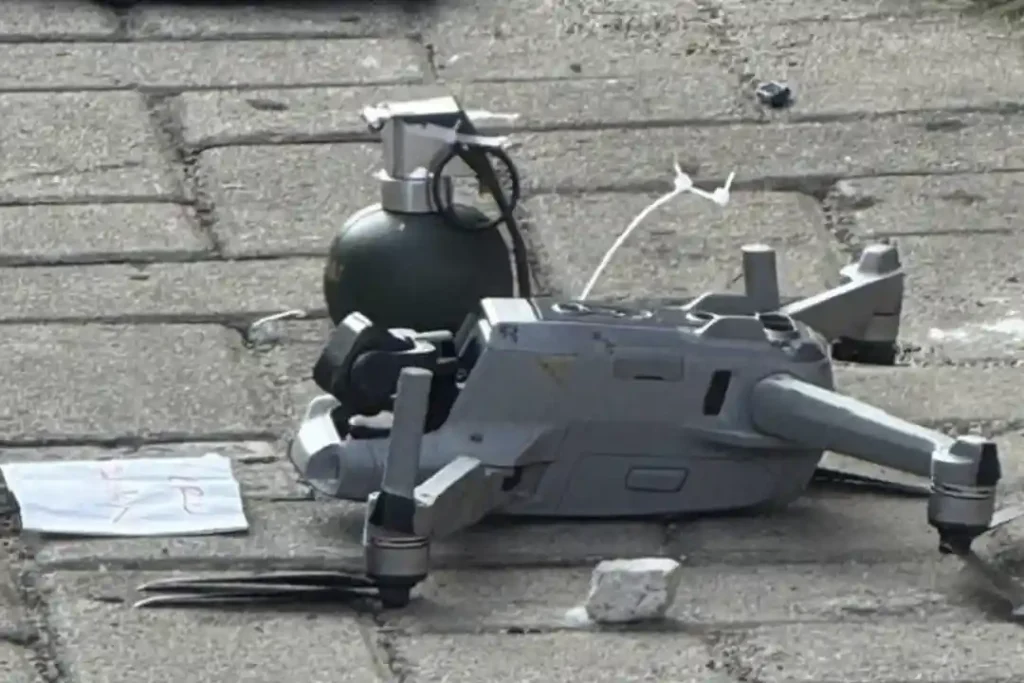 Evidence of a drone dropping an object resembling a grenade accompanied by a threatening message at the house belonging to Novianus Martin Bau, in Pamulang, South Tangerang.